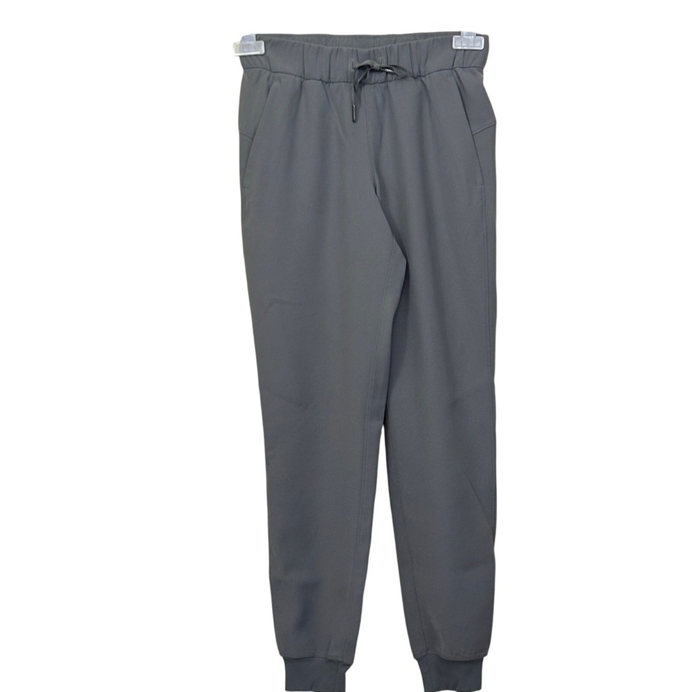 Lululemon On the Fly Jogger 7/8 Pant Dark Grey Woven Size 2 Sporty Travel Yoga
